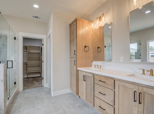 19450 Vista Del Monte Ct, Redding, CA 96003 - full bathroom featuring a marble finish shower, double vanity, marble finish floors, a spacious closet, and recessed lighting