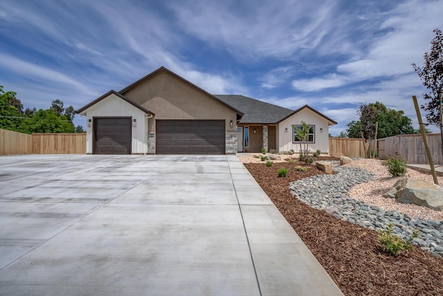 19450 Vista Del Monte Ct, Redding, CA 96003 - single story home with an attached garage, driveway, stone siding, and stucco siding