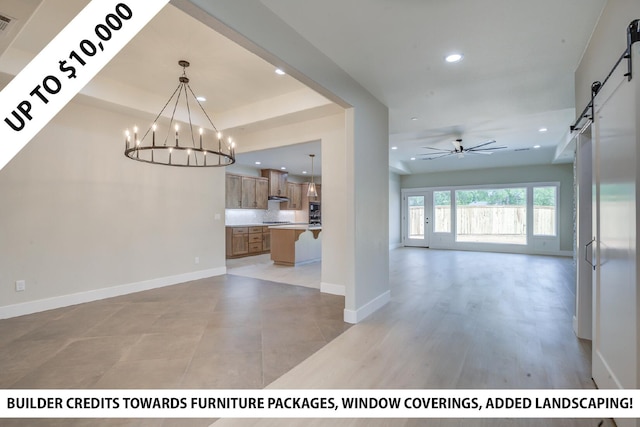 19450 Vista Del Monte Ct, Redding, CA 96003 - unfurnished dining area featuring a barn door, recessed lighting, a chandelier, and a ceiling fan