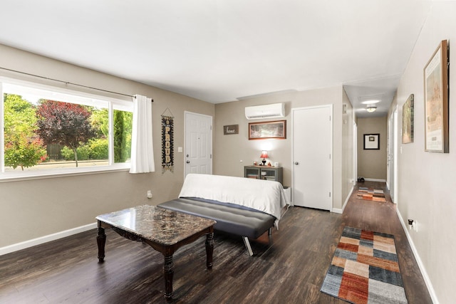 2647 Shasta View Dr, Redding, CA 96002 - bedroom featuring an AC wall unit and dark wood-style flooring