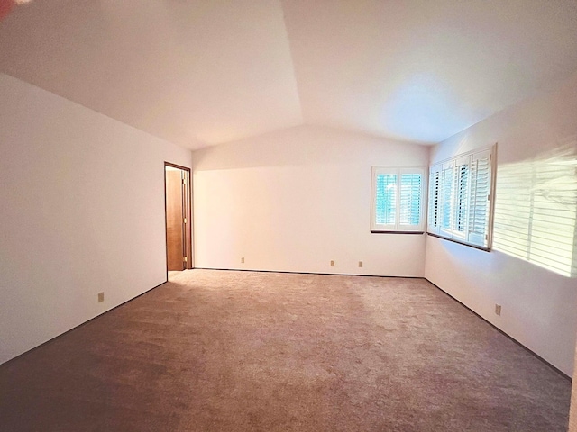 3466 Silverwood St, Redding, CA 96002 - empty room featuring lofted ceiling and carpet flooring