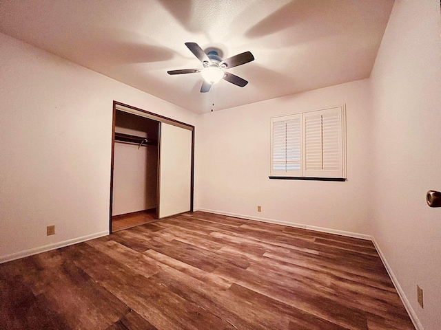 3466 Silverwood St, Redding, CA 96002 - unfurnished bedroom featuring wood finished floors, a closet, and a ceiling fan