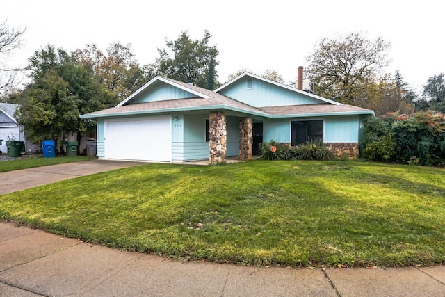 3466 Silverwood St, Redding, CA 96002 - single story home with an attached garage, a front lawn, driveway, and stone siding