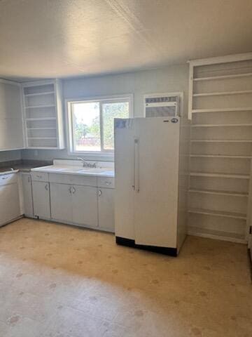 1637 Green St, Redding, CA 96002 - kitchen featuring freestanding refrigerator and open shelves