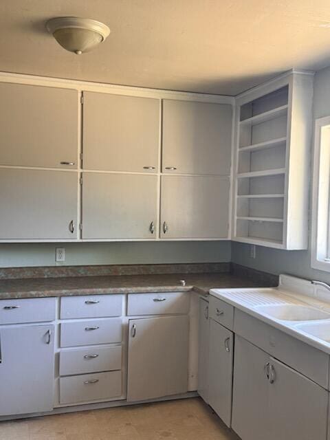 1637 Green St, Redding, CA 96002 - kitchen with open shelves and gray cabinets