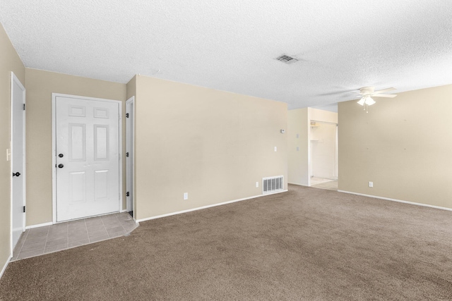 1333 Deborah Dr, Red Bluff, CA 96080 - spare room featuring a ceiling fan, carpet flooring, and a textured ceiling