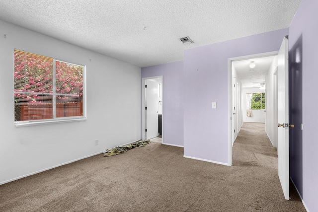 1333 Deborah Dr, Red Bluff, CA 96080 - carpeted spare room featuring a textured ceiling and ceiling fan