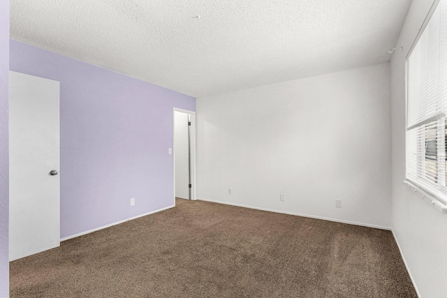 1333 Deborah Dr, Red Bluff, CA 96080 - carpeted empty room featuring a textured ceiling