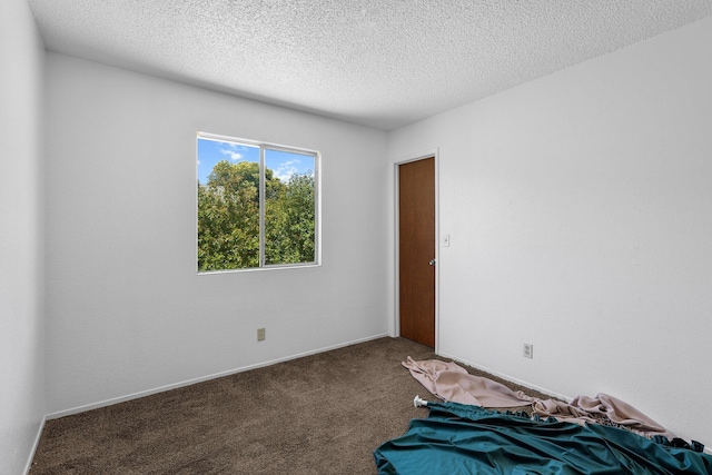 1333 Deborah Dr, Red Bluff, CA 96080 - unfurnished bedroom featuring carpet and a textured ceiling