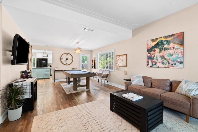 4676 Dandelion Dr, Redding, CA 96002 - living room with wood finished floors and billiards table