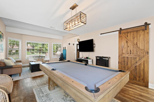 4676 Dandelion Dr, Redding, CA 96002 - recreation room with wood finished floors, a barn door, and billiards