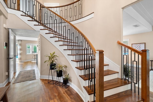 4676 Dandelion Dr, Redding, CA 96002 - stairs with wood finished floors and a towering ceiling