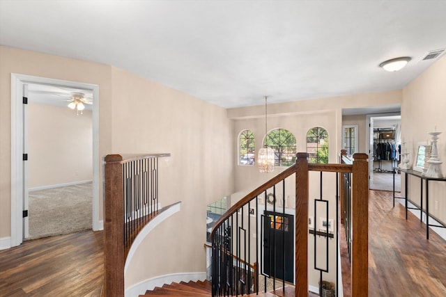 4676 Dandelion Dr, Redding, CA 96002 - stairs featuring a chandelier, wood finished floors, and a ceiling fan