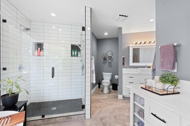 4676 Dandelion Dr, Redding, CA 96002 - full bathroom with vanity, a stall shower, and recessed lighting