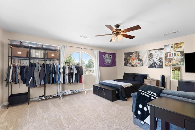 4676 Dandelion Dr, Redding, CA 96002 - carpeted bedroom with multiple windows and a ceiling fan