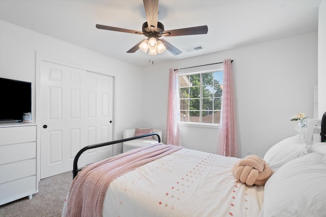 4676 Dandelion Dr, Redding, CA 96002 - bedroom featuring carpet, a closet, and a ceiling fan