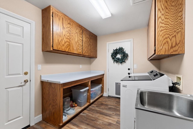 4676 Dandelion Dr, Redding, CA 96002 - laundry room featuring cabinet space, independent washer and dryer, and dark wood-style floors