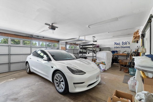 4676 Dandelion Dr, Redding, CA 96002 - garage featuring a garage door opener