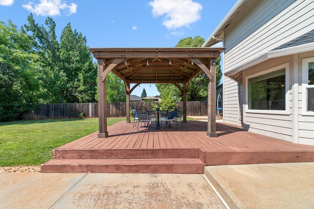 4676 Dandelion Dr, Redding, CA 96002 - wooden terrace with a gazebo, a fenced backyard, and outdoor dining space