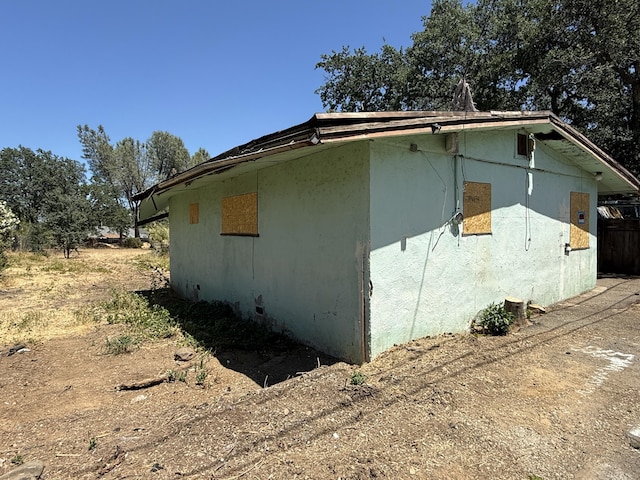 987 July Way, Redding, CA 96003 - view of side of property featuring stucco siding
