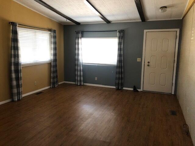 1064 Eagle Nest Rd, Redding, CA 96003 - entryway featuring wood finished floors and beamed ceiling