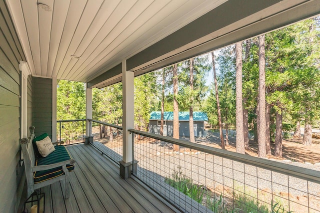 100 Eleanore Ln, Trinity Center, CA 96091 - wooden terrace with view of wooded area