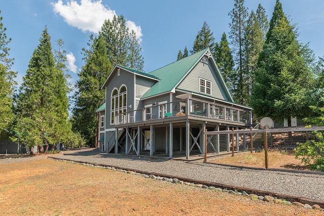 100 Eleanore Ln, Trinity Center, CA 96091 - back of house with a wooden deck, a metal roof, and stairway