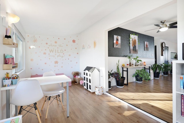 3055 Ryan Ln, Redding, CA 96003 - dining room featuring wallpapered walls, wood finished floors, and a ceiling fan