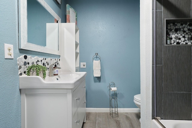 3055 Ryan Ln, Redding, CA 96003 - full bath featuring wood finished floors and vanity