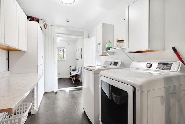 3055 Ryan Ln, Redding, CA 96003 - washroom featuring cabinet space and washer and dryer