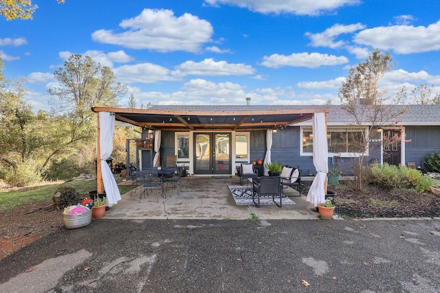 3055 Ryan Ln, Redding, CA 96003 - rear view of house featuring a patio and outdoor dining space