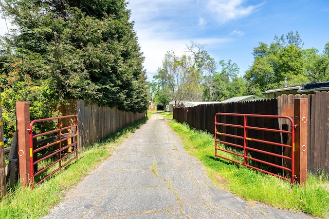 1440 Oakdale Ln, Redding, CA 96002 - view of asphalt road with a gated entry