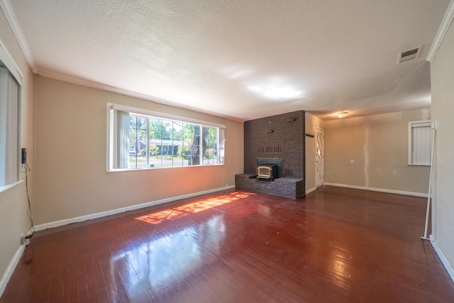 1440 Oakdale Ln, Redding, CA 96002 - unfurnished living room featuring wood finished floors, a textured ceiling, and crown molding