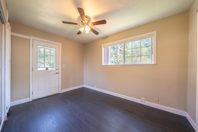 1440 Oakdale Ln, Redding, CA 96002 - foyer featuring healthy amount of natural light, dark wood-style floors, and ceiling fan