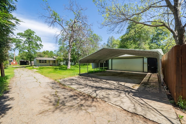 1440 Oakdale Ln, Redding, CA 96002 - view of vehicle parking with a detached garage and driveway