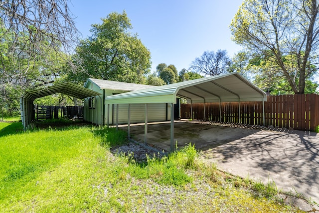 1440 Oakdale Ln, Redding, CA 96002 - view of car parking featuring a detached carport and driveway