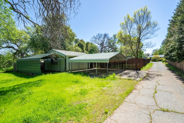 1440 Oakdale Ln, Redding, CA 96002 - view of yard featuring a carport