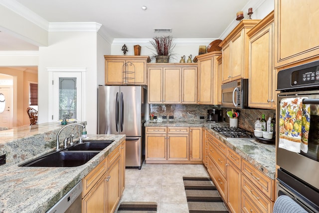 1835 Dellwood Dr, Redding, CA 96003 - kitchen with appliances with stainless steel finishes, ornamental molding, backsplash, light tile patterned floors, and light stone counters