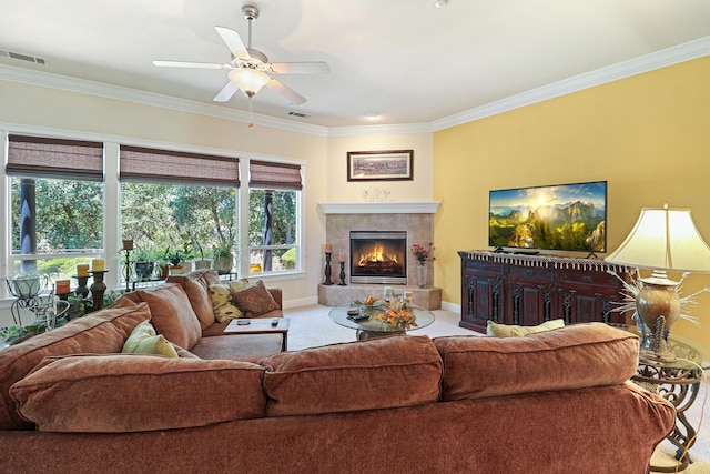 1835 Dellwood Dr, Redding, CA 96003 - carpeted living area with ornamental molding, a tile fireplace, and ceiling fan