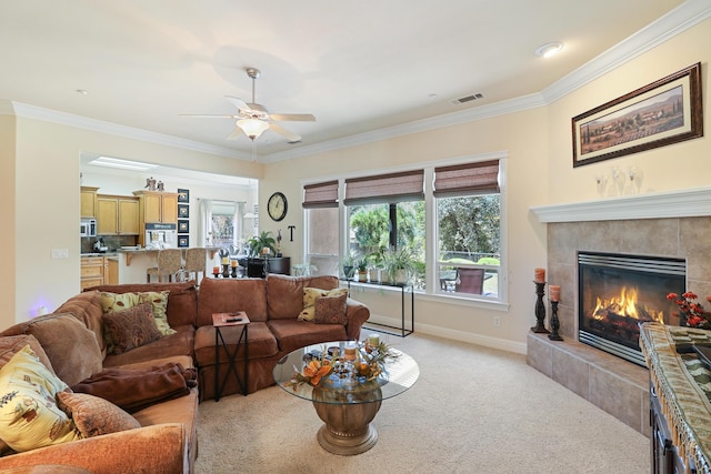 1835 Dellwood Dr, Redding, CA 96003 - living room with ornamental molding, a ceiling fan, light carpet, and a fireplace