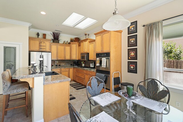 1835 Dellwood Dr, Redding, CA 96003 - kitchen with stainless steel appliances, ornamental molding, tasteful backsplash, a breakfast bar area, and a center island with sink