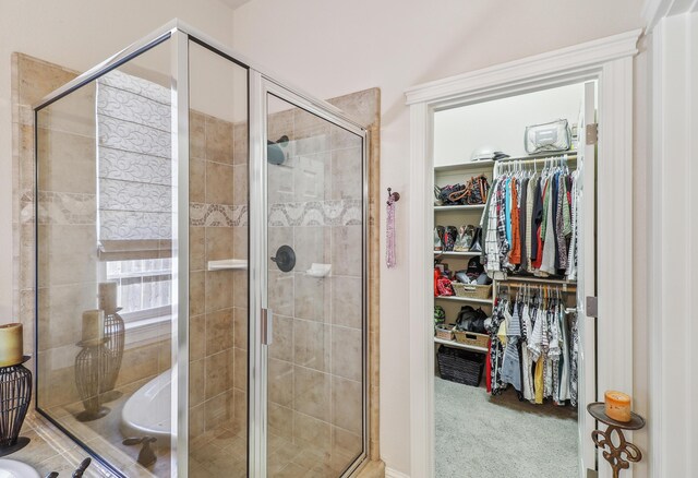 1835 Dellwood Dr, Redding, CA 96003 - bathroom featuring a spacious closet, a shower stall, and a bath