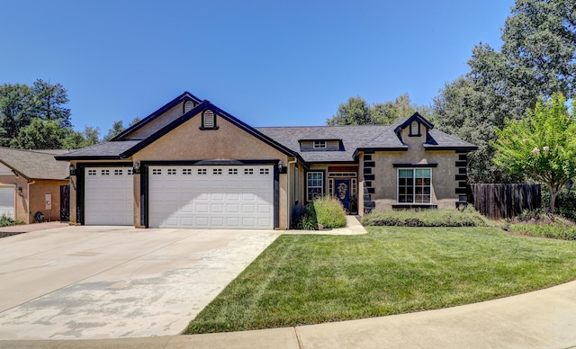 1835 Dellwood Dr, Redding, CA 96003 - view of front of property with concrete driveway, an attached garage, and stucco siding