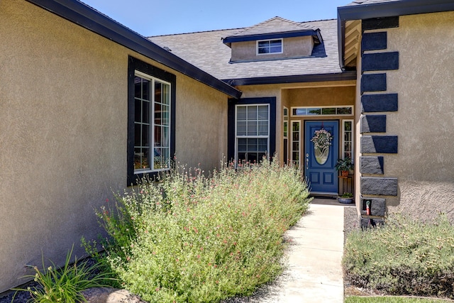 1835 Dellwood Dr, Redding, CA 96003 - entrance to property featuring stucco siding and a shingled roof