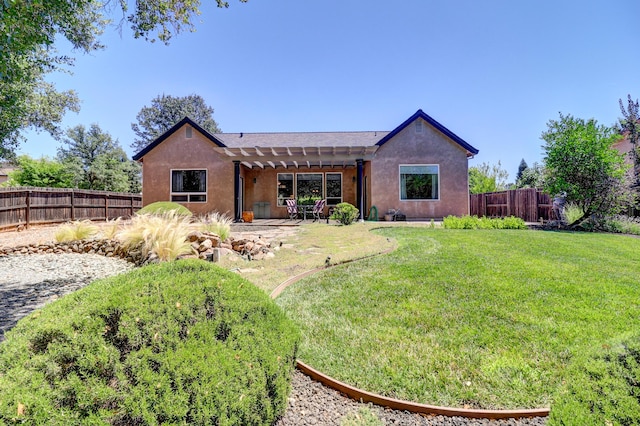 1835 Dellwood Dr, Redding, CA 96003 - back of property with a pergola, a fenced backyard, stucco siding, and a patio area