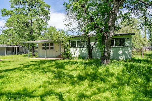 1430 Oakdale Ln, Redding, CA 96003 - back of house with a yard and a patio area
