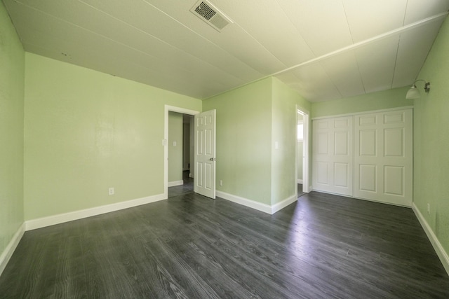 1430 Oakdale Ln, Redding, CA 96003 - unfurnished bedroom with dark wood finished floors and a closet