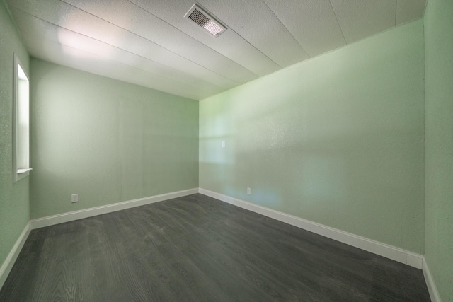 1430 Oakdale Ln, Redding, CA 96003 - spare room featuring dark wood-style flooring and baseboards