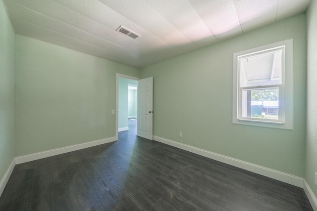 1430 Oakdale Ln, Redding, CA 96003 - empty room featuring dark wood-type flooring and baseboards