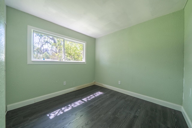 1430 Oakdale Ln, Redding, CA 96003 - spare room featuring dark wood-style floors and baseboards